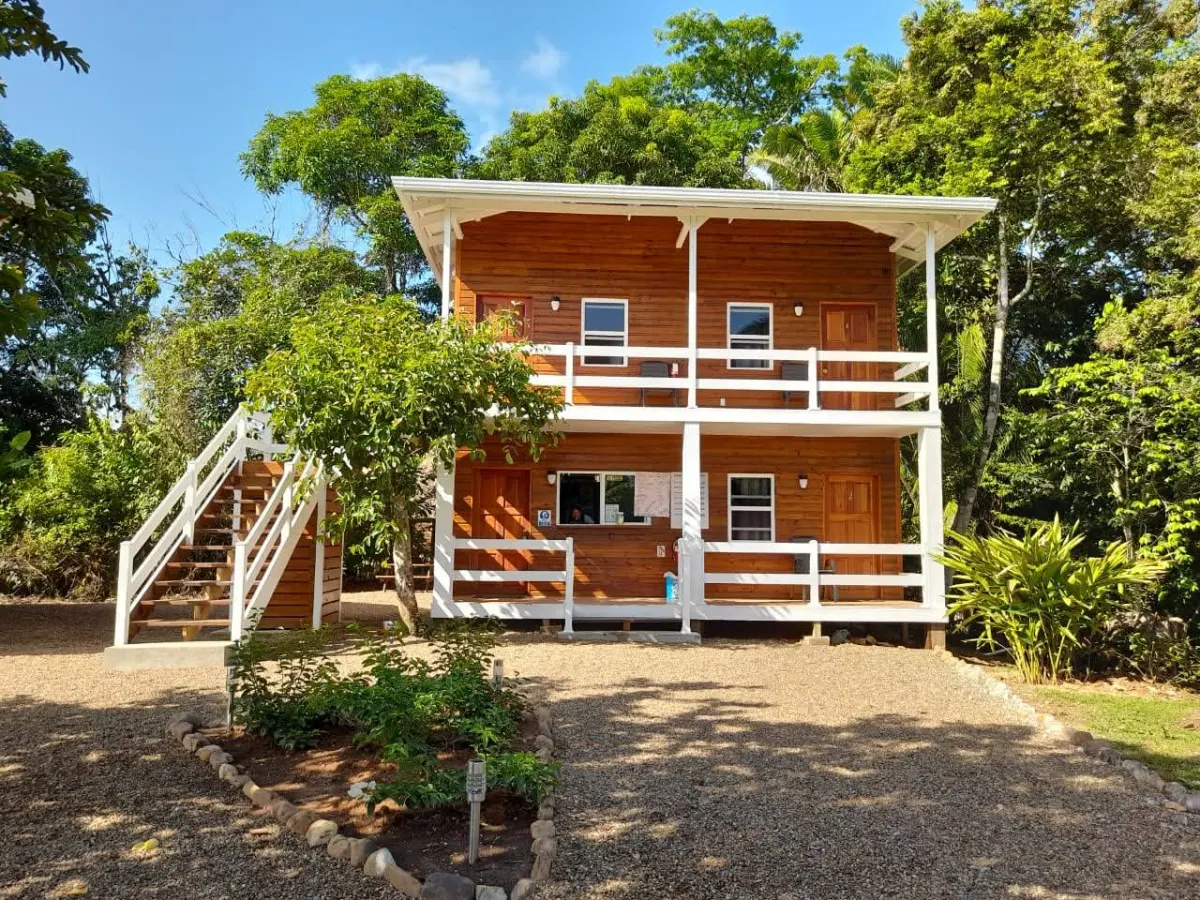Two-story timber lodging building at Agua Clara Eco Park
